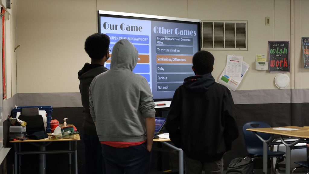 Students present their game concepts.